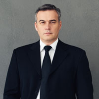Professional businessman in black suit and tie portrait